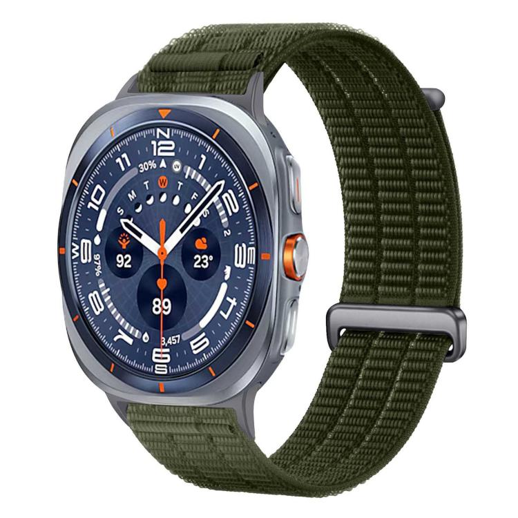 Dark green nylon watch band with a metal loop and textured weave.