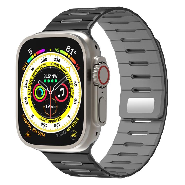 Two-tone silicone watch band in black and dark gray on a smartwatch