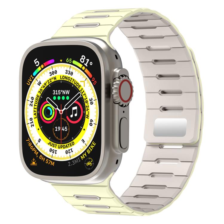 Two-tone silicone Apple Watch band with pale yellow outer links and light gray inner surface
