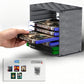 Game disc storage tower holding game cases and cartridges, black open-front design