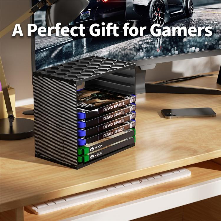 Game disc storage tower on desk, black modular unit with stacked shelf compartments