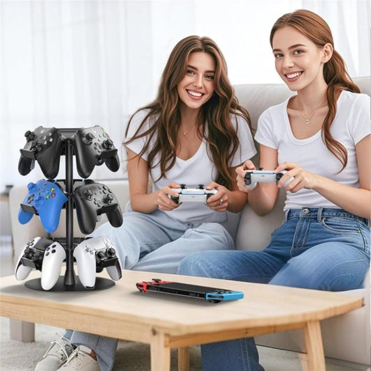 Three-tier rotating game controller stand with angled holders beside a seating setup
