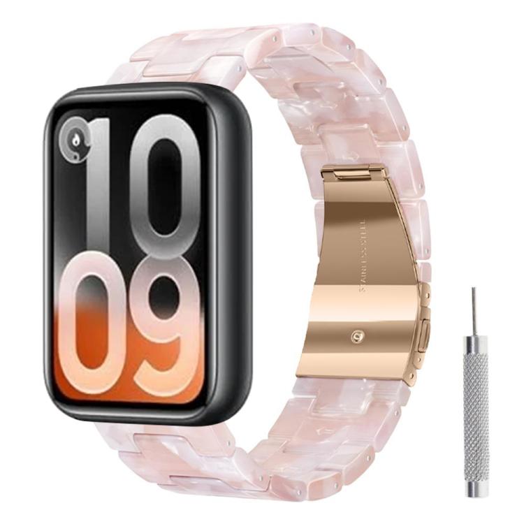 Translucent pale pink resin watch band with rose gold clasp and adjustment tool
