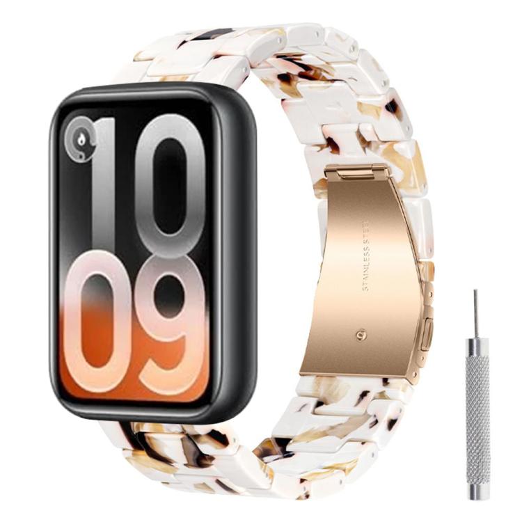 White resin watch band with brown tortoiseshell accents, gold-tone clasp and sizing tool
