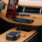Bluetooth car audio transceiver adapter plugged into dashboard audio ports