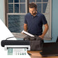Black document scanner storage bag opened on desk with portable scanner inside.