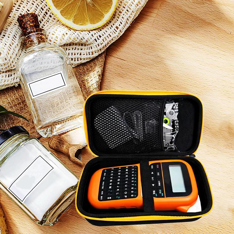 Black label maker storage bag opened with label maker, keyboard pad, and screen accessory