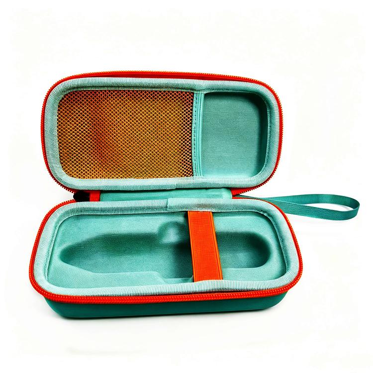 Teal hard zippered storage bag open with mesh divider and orange elastic strap.