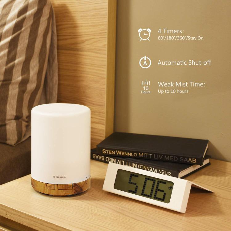 Ultrasonic essential oil diffuser with white top and warm wood base