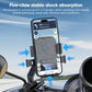 Wireless charging phone mount with shock-absorbing bracket, holding a dark phone