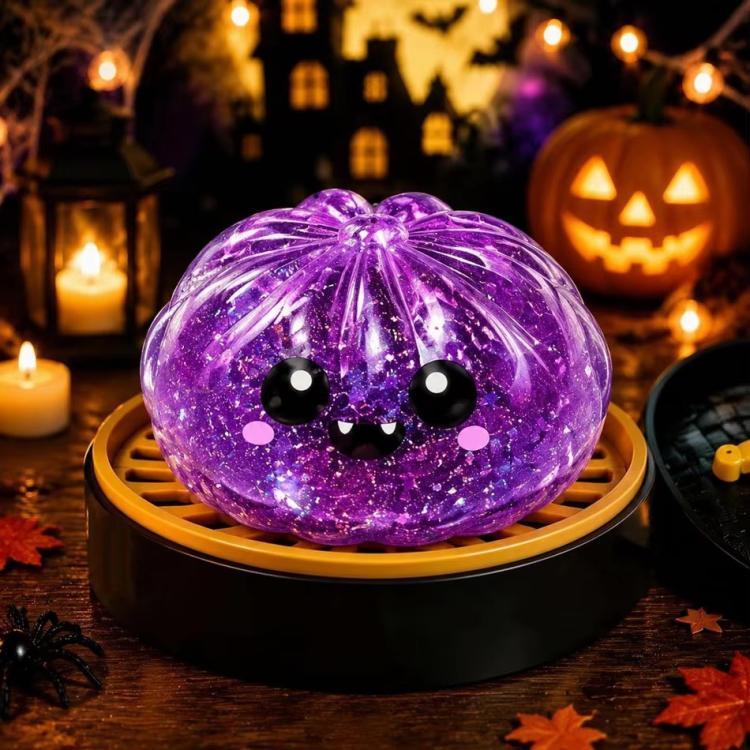 Purple glitter monster-face dumpling squishy stress relief toy with round black eyes