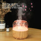 Wood-grain aroma diffuser with warm orange-lit rotating jellyfish water effect