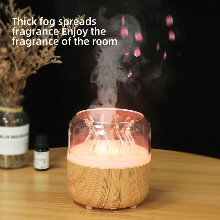 Wood-grain aroma diffuser with warm orange-lit rotating jellyfish water effect