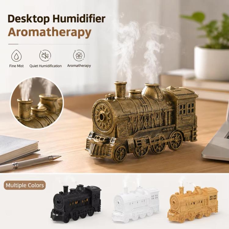 Train-shaped desktop humidifier aroma diffuser with visible mist and gold finish