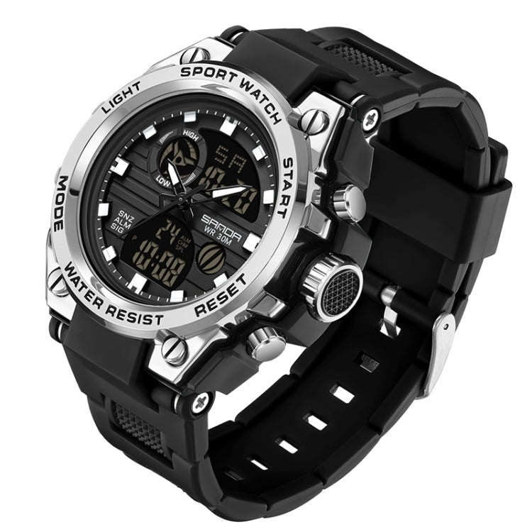 Silver-tone sport wristwatch with black silicone strap, round analog-digital display, WR 30M.