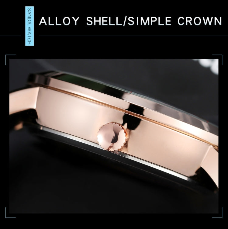 Watch case close-up with brushed metal finish and crown detail on steel bracelet