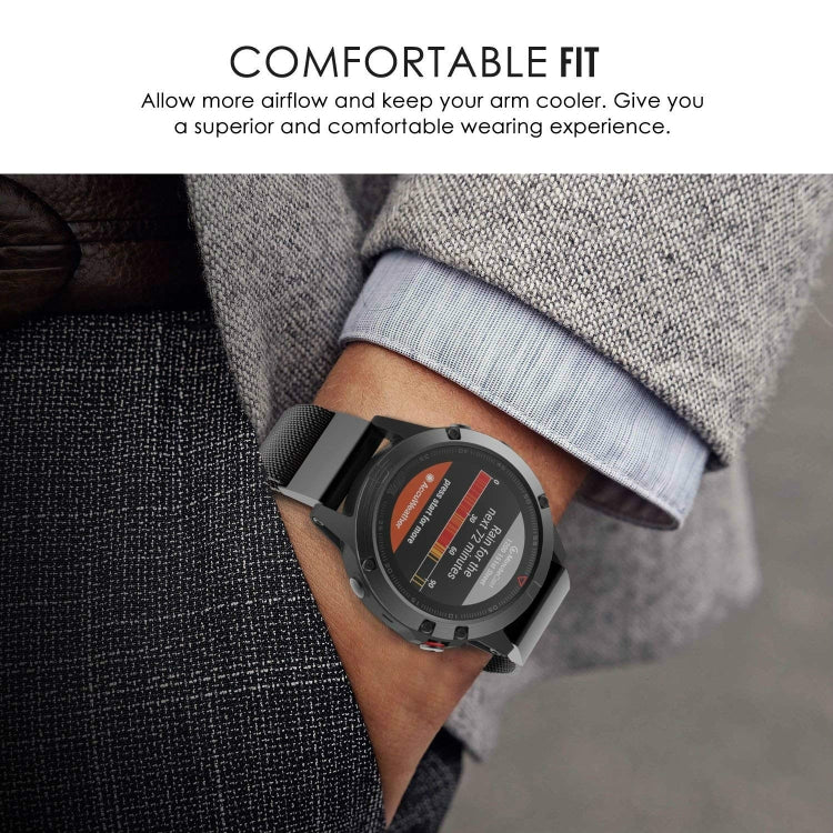 Black milanese stainless steel watch band on wrist with magnetic clasp