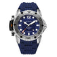 Round sports watch with stainless case, blue silicone band, and blue dial with markers.