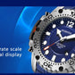 Blue dial sports watch with large clear numerals and white hands on stainless case.