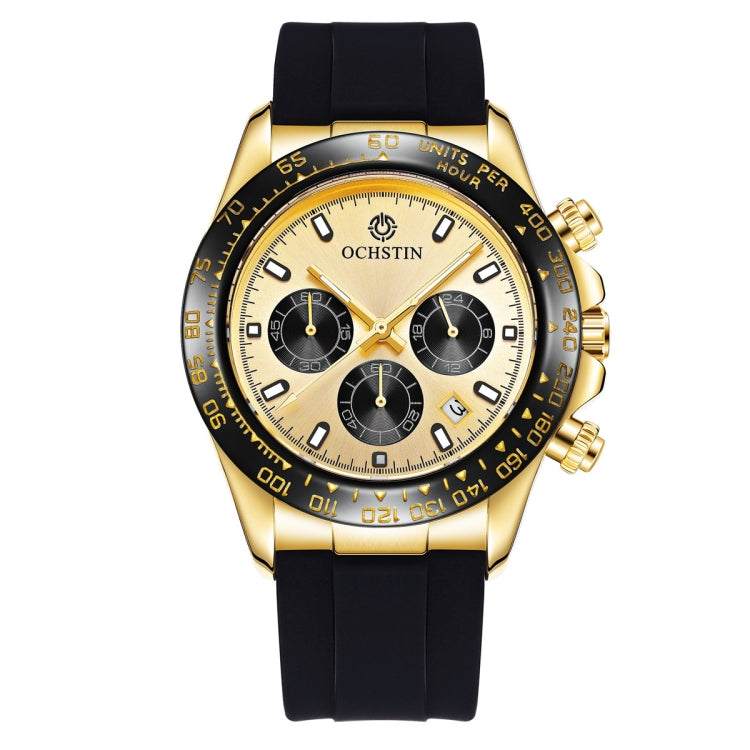 Gold-tone quartz chronograph watch front view with black silicone strap and subdials