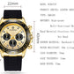 Gold-tone quartz wristwatch with black silicone strap, beige multi-dial face