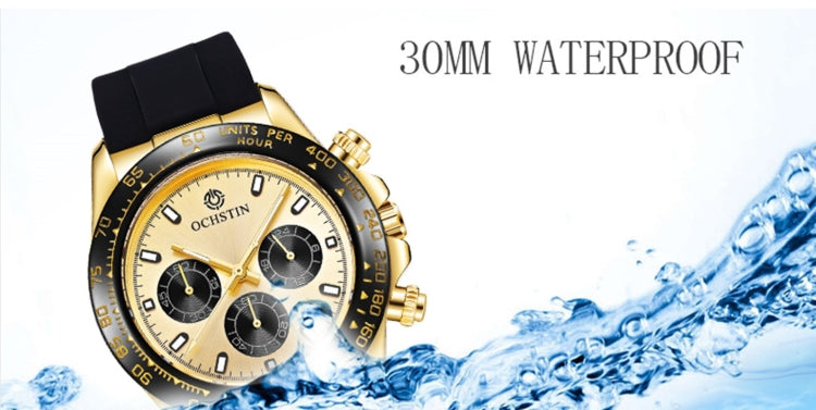 Gold-tone quartz wristwatch with black silicone strap, multi-dial beige face