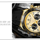 Gold-tone quartz chronograph watch with white dial, black subdials and hour markers