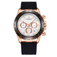 Rose-gold quartz wristwatch with black silicone strap, white multi-dial face with orange accents