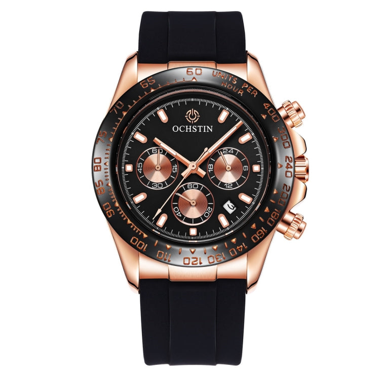 Rose-gold quartz wristwatch with black silicone strap, black multi-dial face with orange accents