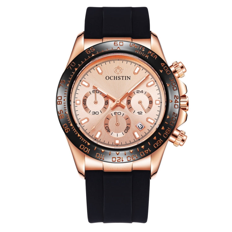 Rose-gold quartz wristwatch with black silicone strap, light multi-dial face with orange accents