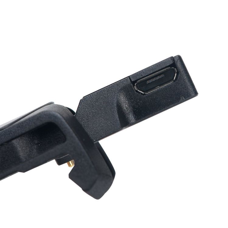 Black charging cable connector with rectangular port opening for watch dock
