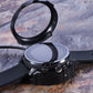 Black smartwatch charging dock with round silver charging pad and cable connector