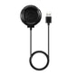 Round black charging dock with cable and USB plug