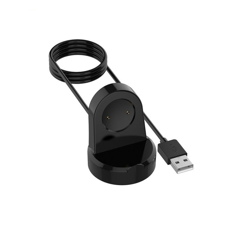 Black watch charging stand with coiled cable and USB connector base.