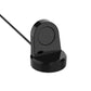 Black charging stand cradle with two charging contacts, angled view.