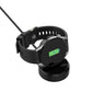 Black watch charging dock with strap holder, open cradle detail.
