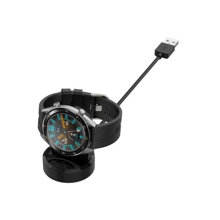 Black watch charging dock holding a smartwatch, with USB charging cable.