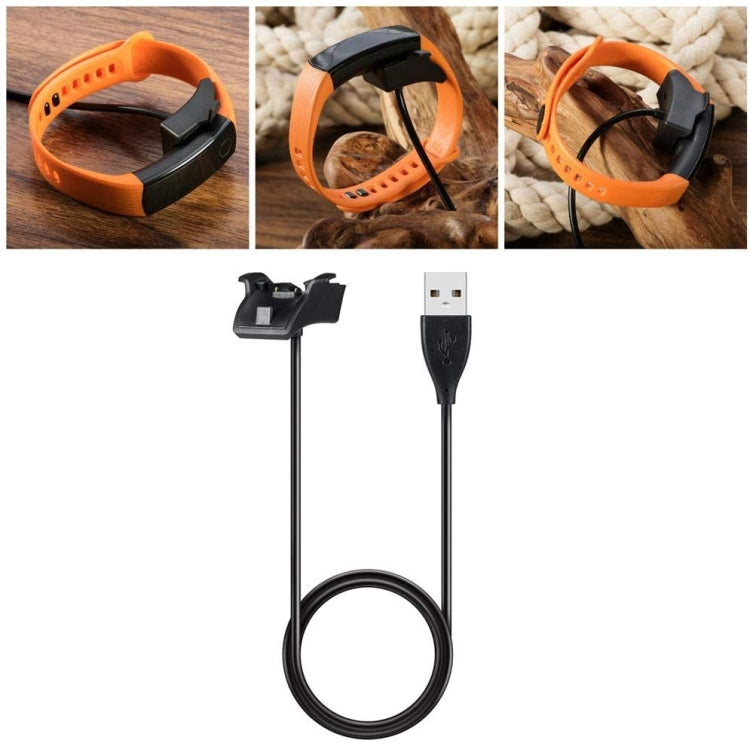 Orange and black wristband charger cable with USB-A plug and charging dock