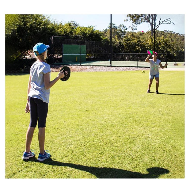 Children playing with handheld sticky target ball paddle and foam ball