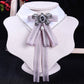 White shirt collar with lilac striped bow tie and rhinestone pearl centerpiece