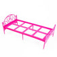 Mini pink plastic doll bed frame with decorative scroll headboard and slatted base