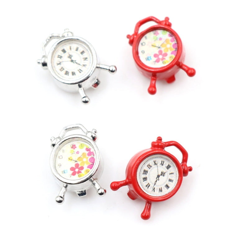 Mini alarm clock accessory, two silver and two red clocks arranged in pairs