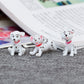 6-piece Dalmatian miniature toy set with small white-and-black spotted puppies