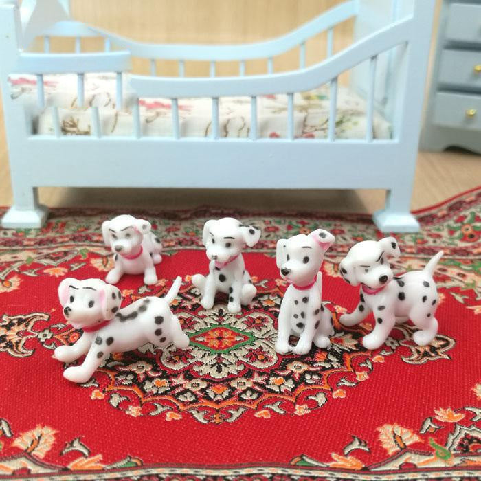 6-piece Dalmatian miniature toy set on a rug with tiny puppy figures