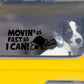 Car window decal sticker with 'Movin' as Fast as I Can!' text and turtle graphic