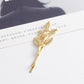 Gold leaf hair clip with five-leaf motif and tapered pin