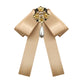 Champagne satin bow with gold pearl and rhinestone floral brooch, hanging teardrop pearl