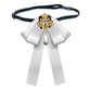 White ribbon bow tie belt with gold pearl cross and teardrop pendant