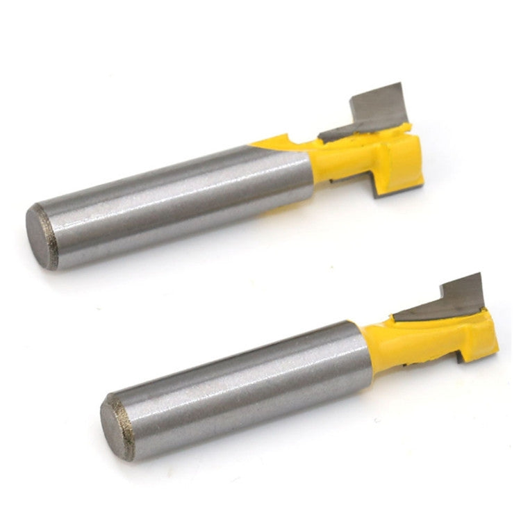 Pair of keyhole milling cutters with yellow guards on silver cylindrical shanks