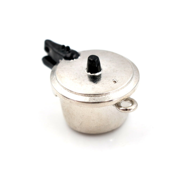 Mini metal pressure cooker with lid and black knob and side handle